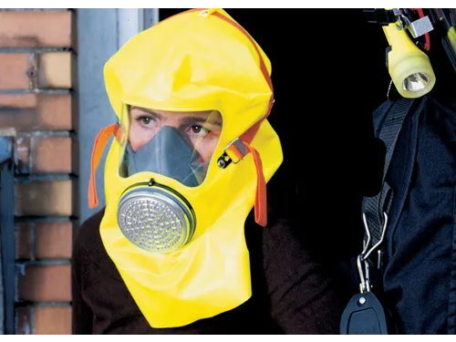 MSA S-Cap CO P vluchtmasker geel in lichtreflecterende muurbox