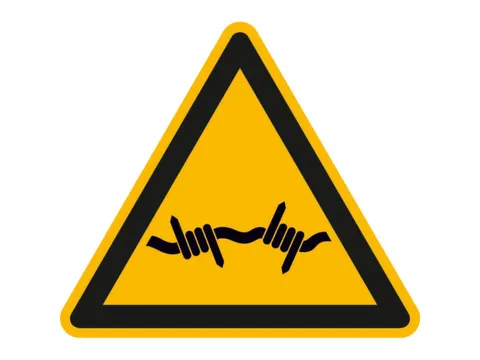 waarschuwingsbord,v. binnen/buiten,Waarschuwing voor prikkeldraad