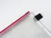 etui B6 transparant met rode rits